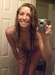 Amateur girl shots herself nude in the mirror to send pics to her boyfriend living in another town