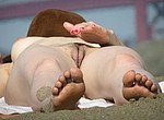 Real nudist beach voyeur porn photos. Amateur naturist women taking sun bath nude and voyeurist photographers take pictures of their hot nude bodies, butts and naked vaginas