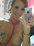 Beautiful girl next-door taking selfies of herself in the mirror, beautiful fake big tits, round ass and shaved pussy fingering