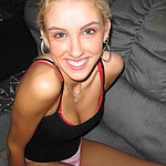 Beautiful smiling blonde girl  shows her pussy and ass spreaded close up