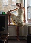 Skinny german wife taking dress off and posing nude in front of her husband... and showing every corner of her beautiful skinny slim body - homemade porn photos