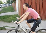 Amateur girlfriend rides her bicycle, shows her pink pussy close up and gives a great blowjob to her boyfriend on these homemade porn photos