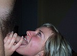 Cheerful blonde woman doing so great blowjob for her lover - homemade porn photos