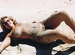 Mature wife posing on the beach