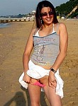 cute women flashing pussies upskirt on the beach and in public